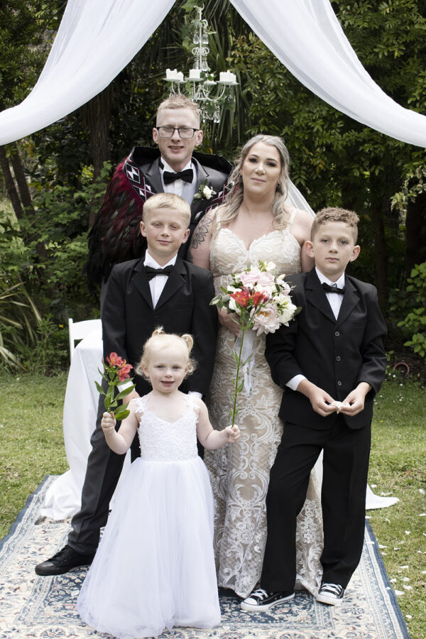 family portrait at parents wedding